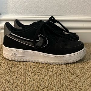 Black nike air forces with grey black and white swoosh